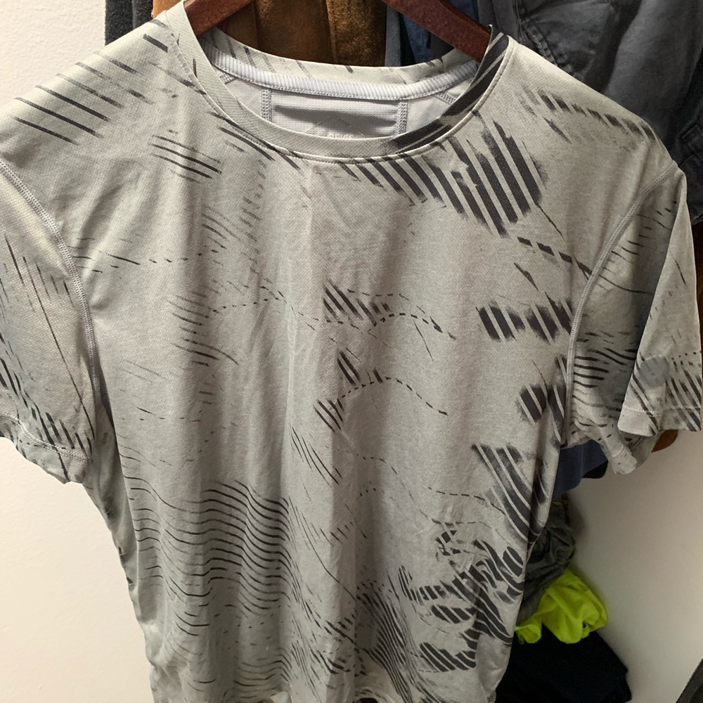 ASICS running shirt.